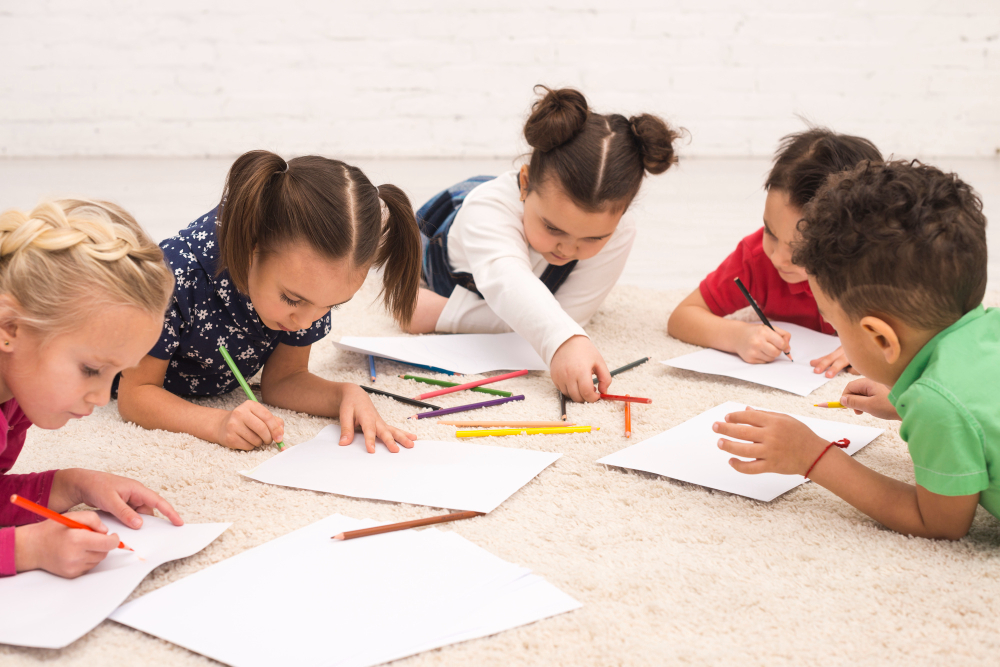 A classroom scene showing young students engaged in collaborative learning activities during core curriculum time.